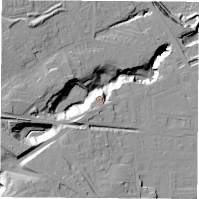 Shaded relief map of the ground around SR77BY, computed from Environment Agency LiDAR. The ground here sits at about 29 m above sea level and falls 49 m across the surrounding 800 m. Surface water reaching this point runs off ground lying to the south-west, 10.6 m higher.