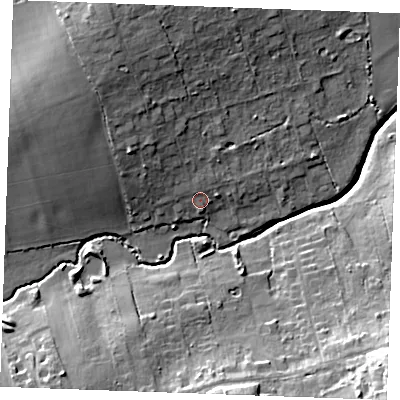 Shaded relief map of the ground around SS120JD, computed from Environment Agency LiDAR. The ground here sits at about 13 m above sea level and falls 20 m across the surrounding 800 m. Surface water reaching this point runs off ground lying to the north-west, 9.1 m higher.