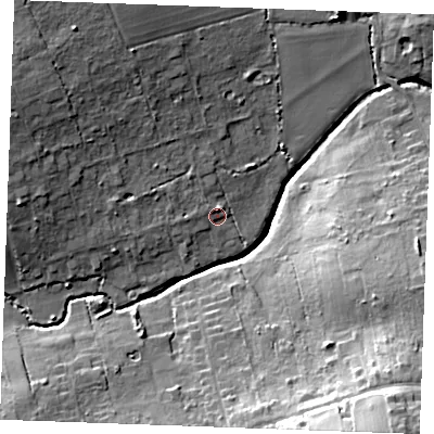 Shaded relief map of the ground around SS120JT, computed from Environment Agency LiDAR. The ground here sits at about 11 m above sea level and falls 22 m across the surrounding 800 m. Surface water reaching this point runs off ground lying to the north-west, 11.6 m higher.