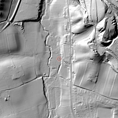 Shaded relief map of the ground around ST104ER, computed from Environment Agency LiDAR. The ground here sits at about 136 m above sea level and falls 86 m across the surrounding 800 m. Surface water reaching this point runs off ground lying to the east, 51.2 m higher.