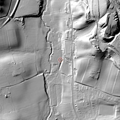 Shaded relief map of the ground around ST104EW, computed from Environment Agency LiDAR. The ground here sits at about 136 m above sea level and falls 86 m across the surrounding 800 m. Surface water reaching this point runs off ground lying to the east-north-east, 52.8 m higher.