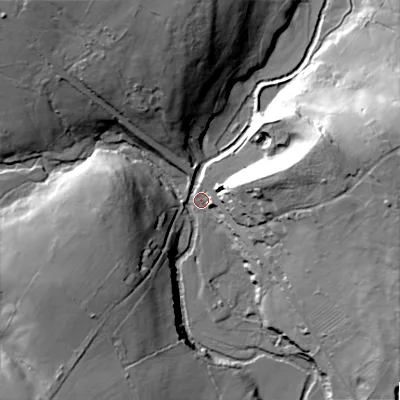 Shaded relief map of the ground around ST137PP, computed from Environment Agency LiDAR. The ground here sits at about 243 m above sea level and falls 44 m across the surrounding 800 m. Surface water reaching this point runs off ground lying to the east-north-east, 39.5 m higher.
