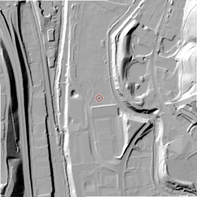 Shaded relief map of the ground around ST15GP, computed from Environment Agency LiDAR. The ground here sits at about 124 m above sea level and falls 40 m across the surrounding 800 m. Surface water reaching this point runs off ground lying to the south-east, 2.1 m higher.