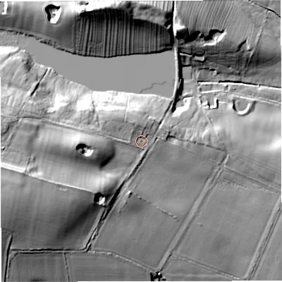 Shaded relief map of the ground around ST216QQ, computed from Environment Agency LiDAR. The ground here sits at about 136 m above sea level and falls 35 m across the surrounding 800 m. Surface water reaching this point runs off ground lying to the west-south-west, 16.6 m higher.