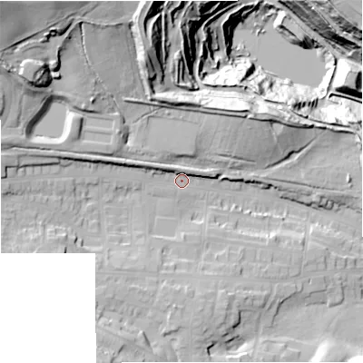 Shaded relief map of the ground around ST56JQ, computed from Environment Agency LiDAR. The ground here sits at about 128 m above sea level and falls 63 m across the surrounding 800 m. Surface water reaching this point runs off ground lying to the west-north-west, 9.4 m higher.