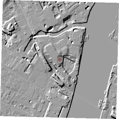 Shaded relief map of the ground around SW100XG, computed from Environment Agency LiDAR. The ground here sits at about 7 m above sea level and falls 48 m across the surrounding 800 m. Surface water reaching this point runs off ground lying to the south, 6.3 m higher.