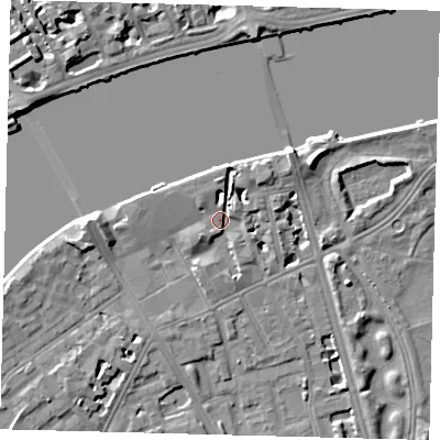 Shaded relief map of the ground around SW114SR, computed from Environment Agency LiDAR. The ground here sits at about 5 m above sea level and falls 7 m across the surrounding 800 m. Surface water reaching this point runs off ground lying to the north-north-east, 3.7 m higher.