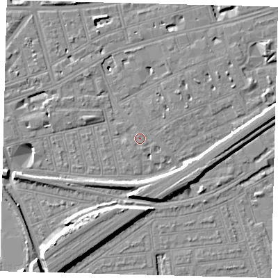 Shaded relief map of the ground around SW115AR, computed from Environment Agency LiDAR. The ground here sits at about 4 m above sea level and falls 11 m across the surrounding 800 m. Surface water reaching this point runs off ground lying to the north, 0.7 m higher.