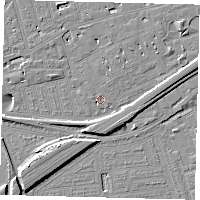 Shaded relief map of the ground around SW115AX, computed from Environment Agency LiDAR. The ground here sits at about 3 m above sea level and falls 11 m across the surrounding 800 m. Surface water reaching this point runs off ground lying to the north-north-east, 2.1 m higher.