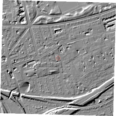 Shaded relief map of the ground around SW115BD, computed from Environment Agency LiDAR. The ground here sits at about 4 m above sea level and falls 11 m across the surrounding 800 m. Surface water reaching this point runs off ground lying to the north, 5.3 m higher.