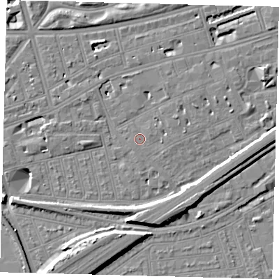 Shaded relief map of the ground around SW115DL, computed from Environment Agency LiDAR. The ground here sits at about 4 m above sea level and falls 12 m across the surrounding 800 m. Surface water reaching this point runs off ground lying to the east-north-east, 0.8 m higher.