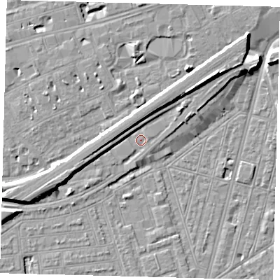 Shaded relief map of the ground around SW115DZ, computed from Environment Agency LiDAR. The ground here sits at about 3 m above sea level and falls 9 m across the surrounding 800 m. Surface water reaching this point runs off ground lying to the north-east, 6.1 m higher.