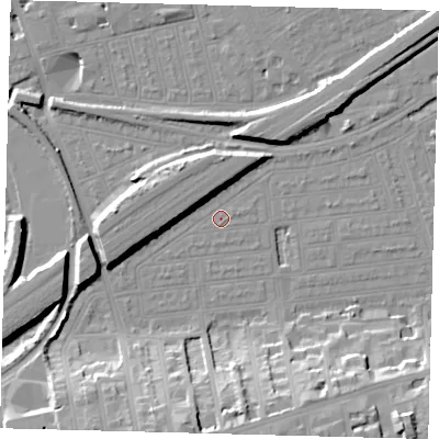 Shaded relief map of the ground around SW115XA, computed from Environment Agency LiDAR. The ground here sits at about 3 m above sea level and falls 20 m across the surrounding 800 m. Surface water reaching this point runs off ground lying to the west, 6.7 m higher.