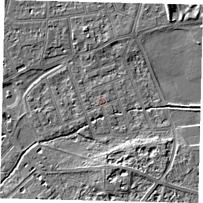 Shaded relief map of the ground around SW130BH, computed from Environment Agency LiDAR. The ground here sits at about 4 m above sea level and falls 7 m across the surrounding 800 m. Surface water reaching this point runs off ground lying to the west, 1.1 m higher.