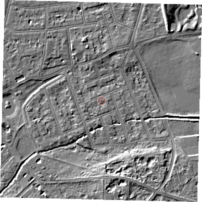 Shaded relief map of the ground around SW130DY, computed from Environment Agency LiDAR. The ground here sits at about 4 m above sea level and falls 7 m across the surrounding 800 m. Surface water reaching this point runs off ground lying to the west-south-west, 1.1 m higher.