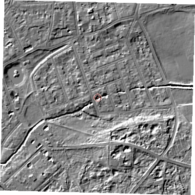 Shaded relief map of the ground around SW130EB, computed from Environment Agency LiDAR. The ground here sits at about 4 m above sea level and falls 7 m across the surrounding 800 m. Surface water reaching this point runs off ground lying to the north, 2.0 m higher.