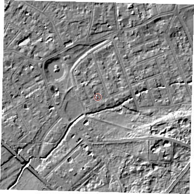 Shaded relief map of the ground around SW130EQ, computed from Environment Agency LiDAR. The ground here sits at about 5 m above sea level and falls 7 m across the surrounding 800 m. Surface water reaching this point runs off ground lying to the north-north-west, 3.4 m higher.