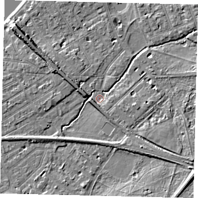 Shaded relief map of the ground around SW130LH, computed from Environment Agency LiDAR. The ground here sits at about 5 m above sea level and falls 11 m across the surrounding 800 m. Surface water reaching this point runs off ground lying to the west-north-west, 5.7 m higher.