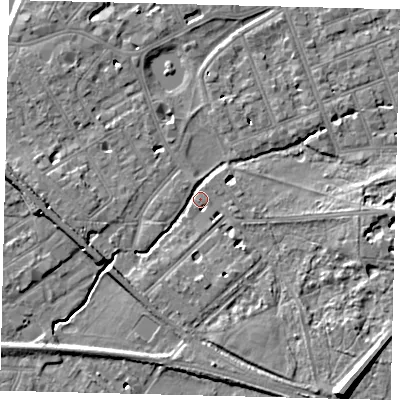 Shaded relief map of the ground around SW130LQ, computed from Environment Agency LiDAR. The ground here sits at about 5 m above sea level and falls 12 m across the surrounding 800 m. Surface water reaching this point runs off ground lying to the south-east, 10.2 m higher.