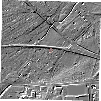 Shaded relief map of the ground around SW130NF, computed from Environment Agency LiDAR. The ground here sits at about 6 m above sea level and falls 12 m across the surrounding 800 m. Surface water reaching this point runs off ground lying to the south-south-east, 11.6 m higher.