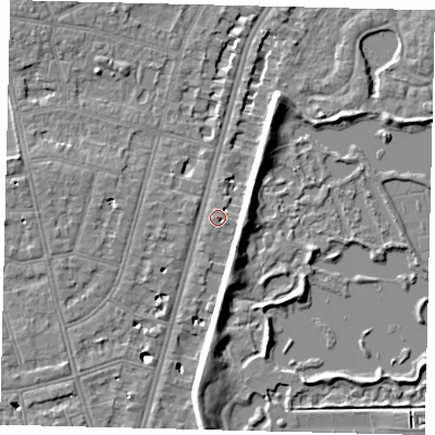 Shaded relief map of the ground around SW139EX, computed from Environment Agency LiDAR. The ground here sits at about 5 m above sea level and falls 7 m across the surrounding 800 m. Surface water reaching this point runs off ground lying to the south-east, 1.2 m higher.