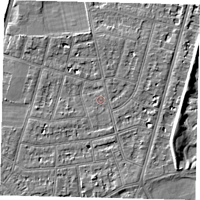 Shaded relief map of the ground around SW139PS, computed from Environment Agency LiDAR. The ground here sits at about 5 m above sea level and falls 7 m across the surrounding 800 m. Surface water reaching this point runs off ground lying to the north-north-west, 4.7 m higher.