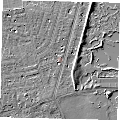 Shaded relief map of the ground around SW139RS, computed from Environment Agency LiDAR. The ground here sits at about 5 m above sea level and falls 8 m across the surrounding 800 m. Surface water reaching this point runs off ground lying to the south-south-east, 7.1 m higher.