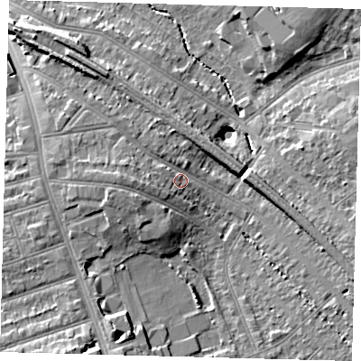 Shaded relief map of the ground around SW164LA, computed from Environment Agency LiDAR. The ground here sits at about 38 m above sea level and falls 14 m across the surrounding 800 m. Surface water reaching this point runs off ground lying to the west, 4.8 m higher.