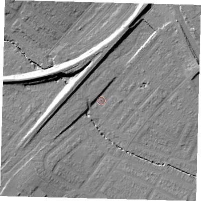 Shaded relief map of the ground around SW165AG, computed from Environment Agency LiDAR. The ground here sits at about 25 m above sea level and falls 18 m across the surrounding 800 m. Surface water reaching this point runs off ground lying to the north, 12.3 m higher.