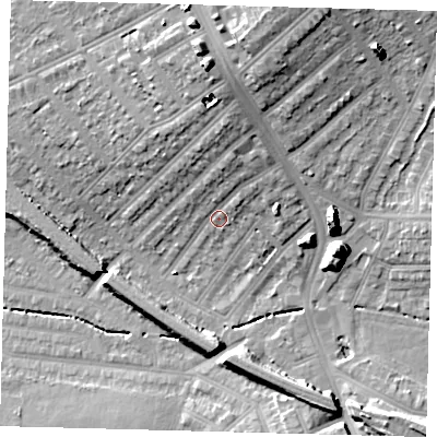 Shaded relief map of the ground around SW165DH, computed from Environment Agency LiDAR. The ground here sits at about 35 m above sea level and falls 20 m across the surrounding 800 m. Surface water reaching this point runs off ground lying to the north-north-east, 5.8 m higher.