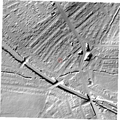 Shaded relief map of the ground around SW165JY, computed from Environment Agency LiDAR. The ground here sits at about 32 m above sea level and falls 20 m across the surrounding 800 m. Surface water reaching this point runs off ground lying to the north-north-east, 5.3 m higher.