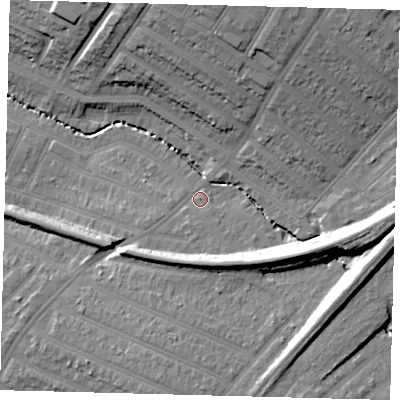 Shaded relief map of the ground around SW166PE, computed from Environment Agency LiDAR. The ground here sits at about 22 m above sea level and falls 21 m across the surrounding 800 m. Surface water reaching this point runs off ground lying to the north, 18.0 m higher.