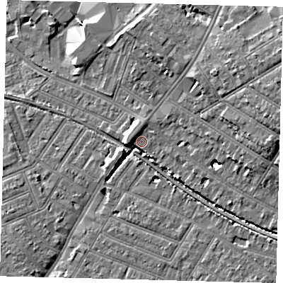 Shaded relief map of the ground around SW179LT, computed from Environment Agency LiDAR. The ground here sits at about 15 m above sea level and falls 12 m across the surrounding 800 m. Surface water reaching this point runs off ground lying to the east, 9.7 m higher.