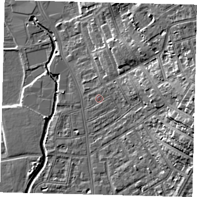 Shaded relief map of the ground around SW182BU, computed from Environment Agency LiDAR. The ground here sits at about 9 m above sea level and falls 21 m across the surrounding 800 m. Surface water reaching this point runs off ground lying to the north-east, 1.6 m higher.