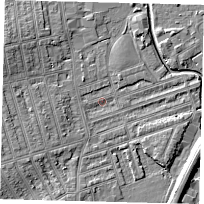 Shaded relief map of the ground around SW184QZ, computed from Environment Agency LiDAR. The ground here sits at about 9 m above sea level and falls 11 m across the surrounding 800 m. Surface water reaching this point runs off ground lying to the south-west, 2.0 m higher.
