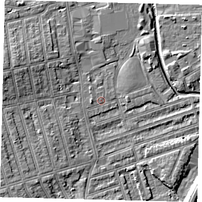 Shaded relief map of the ground around SW184XF, computed from Environment Agency LiDAR. The ground here sits at about 9 m above sea level and falls 11 m across the surrounding 800 m. Surface water reaching this point runs off ground lying to the west, 1.6 m higher.