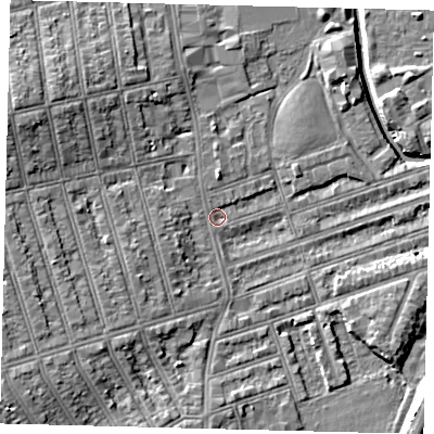 Shaded relief map of the ground around SW185LB, computed from Environment Agency LiDAR. The ground here sits at about 9 m above sea level and falls 11 m across the surrounding 800 m. Surface water reaching this point runs off ground lying to the south-west, 4.3 m higher.