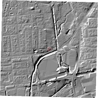 Shaded relief map of the ground around SW191DN, computed from Environment Agency LiDAR. The ground here sits at about 13 m above sea level and falls 7 m across the surrounding 800 m. Surface water reaching this point runs off ground lying to the south-west, 3.1 m higher.