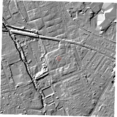 Shaded relief map of the ground around SW191TW, computed from Environment Agency LiDAR. The ground here sits at about 13 m above sea level and falls 8 m across the surrounding 800 m. Surface water reaching this point runs off ground lying to the east-north-east, 1.0 m higher.