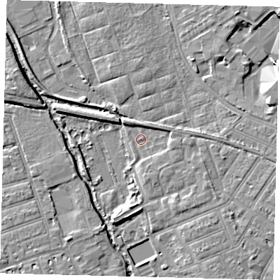 Shaded relief map of the ground around SW191UG, computed from Environment Agency LiDAR. The ground here sits at about 12 m above sea level and falls 6 m across the surrounding 800 m. Surface water reaching this point runs off ground lying to the south-east, 3.3 m higher.