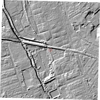 Shaded relief map of the ground around SW191UH, computed from Environment Agency LiDAR. The ground here sits at about 12 m above sea level and falls 6 m across the surrounding 800 m. Surface water reaching this point runs off ground lying to the north-west, 3.5 m higher.