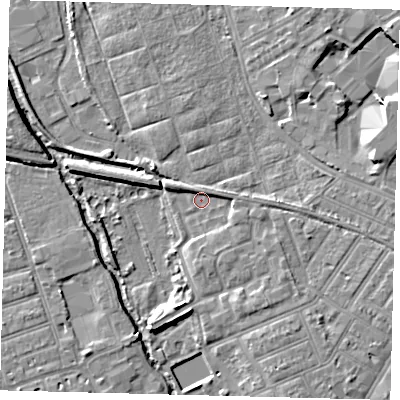 Shaded relief map of the ground around SW191UJ, computed from Environment Agency LiDAR. The ground here sits at about 12 m above sea level and falls 7 m across the surrounding 800 m. Surface water reaching this point runs off ground lying to the east-south-east, 2.9 m higher.