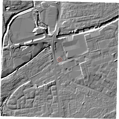 Shaded relief map of the ground around SW192FG, computed from Environment Agency LiDAR. The ground here sits at about 13 m above sea level and falls 7 m across the surrounding 800 m. Surface water reaching this point runs off ground lying to the east-south-east, 5.2 m higher.