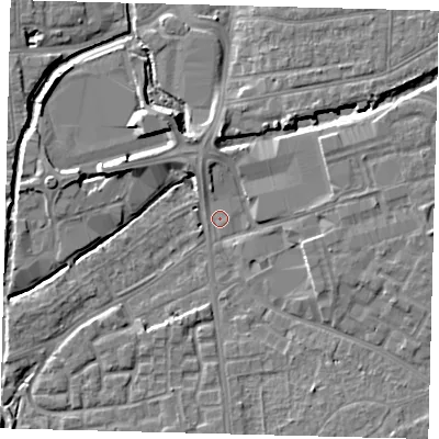 Shaded relief map of the ground around SW192PE, computed from Environment Agency LiDAR. The ground here sits at about 13 m above sea level and falls 6 m across the surrounding 800 m. Surface water reaching this point runs off ground lying to the east, 5.9 m higher.