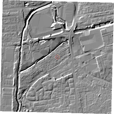 Shaded relief map of the ground around SW192PG, computed from Environment Agency LiDAR. The ground here sits at about 13 m above sea level and falls 6 m across the surrounding 800 m. Surface water reaching this point runs off ground lying to the south-south-east, 5.2 m higher.