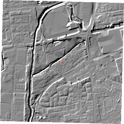 Shaded relief map of the ground around SW192PH, computed from Environment Agency LiDAR. The ground here sits at about 13 m above sea level and falls 6 m across the surrounding 800 m. Surface water reaching this point runs off ground lying to the south-south-east, 5.3 m higher.