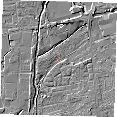Shaded relief map of the ground around SW192RN, computed from Environment Agency LiDAR. The ground here sits at about 13 m above sea level and falls 6 m across the surrounding 800 m. Surface water reaching this point runs off ground lying to the south-south-east, 5.8 m higher.
