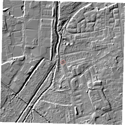 Shaded relief map of the ground around SW192SS, computed from Environment Agency LiDAR. The ground here sits at about 15 m above sea level and falls 6 m across the surrounding 800 m. Surface water reaching this point runs off ground lying to the south, 2.3 m higher.