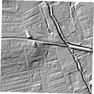 Shaded relief map of the ground around SW198SJ, computed from Environment Agency LiDAR. The ground here sits at about 13 m above sea level and falls 11 m across the surrounding 800 m. Surface water reaching this point runs off ground lying to the west, 4.6 m higher.
