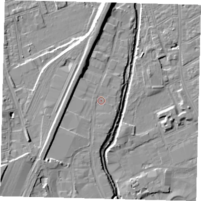 Shaded relief map of the ground around SW198UG, computed from Environment Agency LiDAR. The ground here sits at about 12 m above sea level and falls 13 m across the surrounding 800 m. Surface water reaching this point runs off ground lying to the south-west, 4.8 m higher.